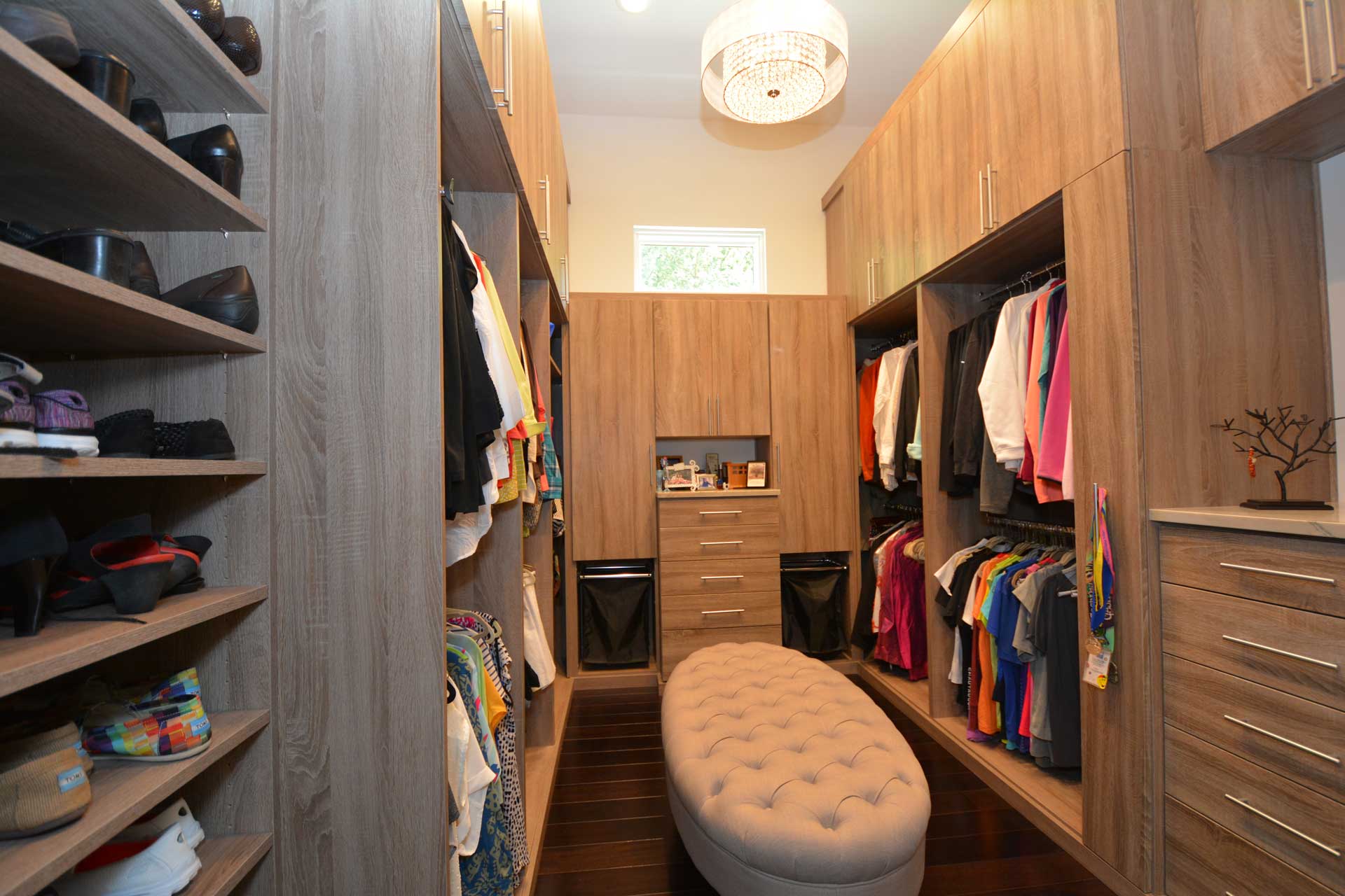 Closet Design Tampa FL An expansive custom closet with ample storage.