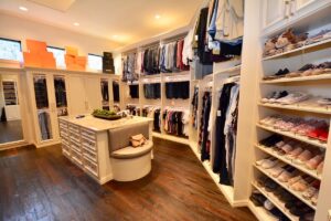 Master Closets Odessa FL Picture of a gorgeous master closet with white shelving and cabinetry.