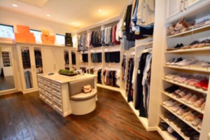 Master Closets Davis Island, FL view of a spacious master closet filled with clothes and shoes